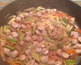 Foto del paso 3 de la receta: Arroz meloso de verduras y salchichas con toque oriental
