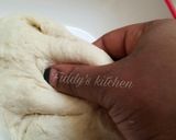 A picture of step 4 of Meat pocket buns.