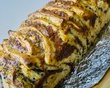 Foto del paso 7 de la receta: PAN 🥖 LIBRO 📚 RELLENO DE QUESO 🧀 Y ALBAHACA 🌿