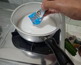 Foto langkah ke 5 dari resep Lupis Ketan Segitiga (tanpa cetakan daun pisang).