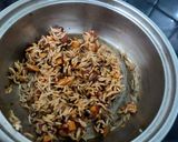 A picture of step 4 of Carrot Tomato Rice.
