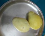A picture of step 1 of Aloo ka halwa.