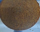 A picture of step 6 of Chocolate Guinness cake with whipped cream icing.