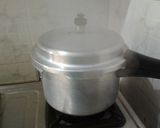A picture of step 6 of Matar Pulao.