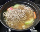 A picture of step 3 of Shrimp and Loofah Yi Mein Noodle Soup.