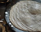 A picture of step 3 of Bajra Bhakri with seasome seeds.