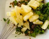 A picture of step 2 of Pineapple, cranberry and cashew raita.