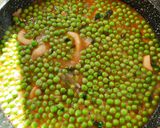 Foto del paso 5 de la receta: Guisantes con anillas de calamar