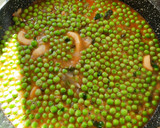Foto del paso 5 de la receta: Guisantes con anillas de calamar