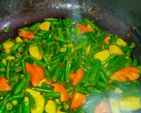 A picture of step 3 of Potato and French Beans.