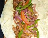 A picture of step 14 of Chicken Frankie Roll.