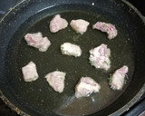 Foto del paso 3 de la receta: Cerdo frito con salsa de champiñones al ajillo y arroz blanco