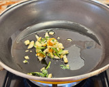 Foto del paso 6 de la receta: Arroz meloso de pulpo y gambones al ajillo
