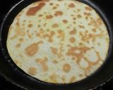 A picture of step 9 of Cheese chicken and veggies tortilla wrap.