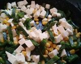 A picture of step 5 of Rajas con Crema (Poblano Strips with Cream, Corn, and Cheese).
