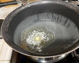 A picture of step 1 of Leftover Salmon-Mushroom Fettuccine Alfredo.