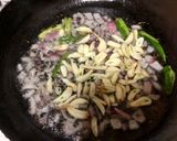 A picture of step 4 of Rajsthani (jaipuri)sabut pyaz ki sabji and tikkad.