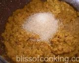 A picture of step 4 of Seb Badam Halwa (Apple Almond Halwa).