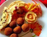 A picture of step 7 of Pita bread with falafel hummus sandwich.