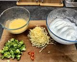 A picture of step 1 of Cheddar, Broccoli and Red Chilli Soufflé Omelette, Garlic roasted Cherry Plum Tomatoes, Olive Oil.