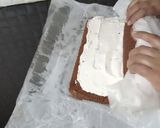 A picture of step 14 of Snickers Chocolate Roll Cake.