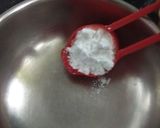A picture of step 1 of Vanilla Pancakes with Strawberry Sauce.