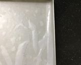 A picture of step 8 of Orange burfi.