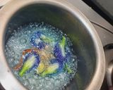 A picture of step 1 of Butterfly pea flower masala tea (gokarna or aparajita).