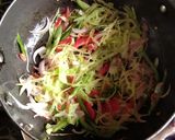 A picture of step 1 of Veg sizzler of sehezwan hakka noodles with sauteed vegetable.