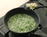 A picture of step 2 of Fried Egg with Scallions by Devina Hermawan.