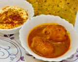 A picture of step 7 of Khatta Mitha Dum Aloo.