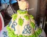 A picture of step 2 of Butter cream doll cake.