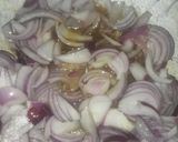 A picture of step 1 of Onion tomato fried rice.