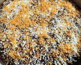 A picture of step 4 of Choco Biko with white coconut shreds and toasted coconut.