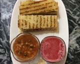 A picture of step 5 of Baked beans with homemade garlic bread and fresh watermelon juice.