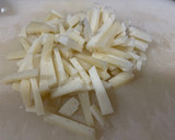 Foto del paso 4 de la receta: Tortilla de patata con queso y cebolla