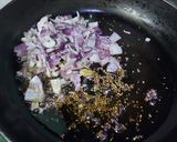 A picture of step 1 of Coconut Chicken Bharta.
