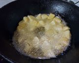 A picture of step 1 of Aloo Morich.