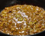 A picture of step 2 of Ghooguni (Spicy White peas curry).