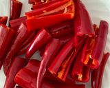A picture of step 2 of Red chilli pickle.