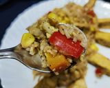 A picture of step 8 of Thai style fried rice with vegetables and tofu.