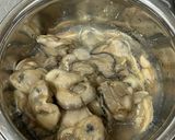 A picture of step 2 of Oyster and Straw Mushroom Brown Rice Porridge.