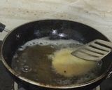 A picture of step 6 of Jowar Sorghum White Millet Masala Poori.