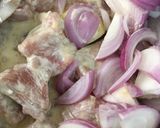 A picture of step 1 of Dahi Chicken.