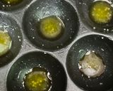 A picture of step 4 of Delicious Gulgule (Dumplings) in an Appe Pan.