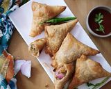 A picture of step 13 of Poha onion triangle samosa.