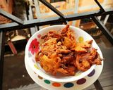 "পেঁয়াজি" বা "পেঁয়াজের পকুরি" (piyaji recipe in Bengali) রেসিপির ধাপ 7 ছবি