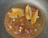 A picture of step 1 of Bangla chicken massala.