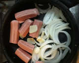 Foto del paso 3 de la receta: Pulpitos con cebolla dorada y acompañamiento (arroz)