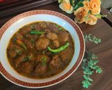 A picture of step 7 of Moong daal Mangochian (fried lentils balls in curry).